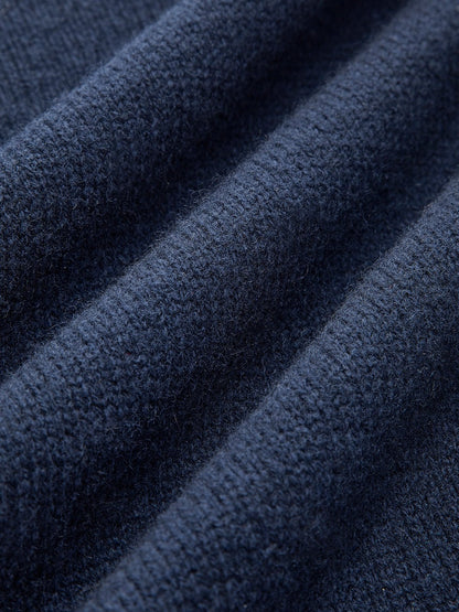 Layered knit polo sweater in navy featuring a denim collar and gold-tone buttons, perfect for stylish and casual outfits. 4