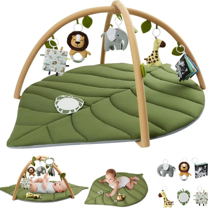 Leaf-shaped baby play gym featuring colorful detachable toys, designed for tummy time with a soft padded mat suitable for newborns and infants. 4