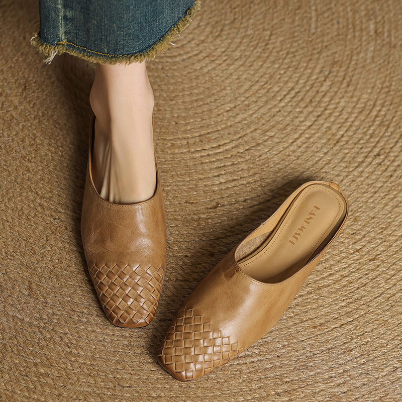 Black leather mules featuring a cushioned insole and woven finish, designed with a square-toe heel for stylish comfort. 3