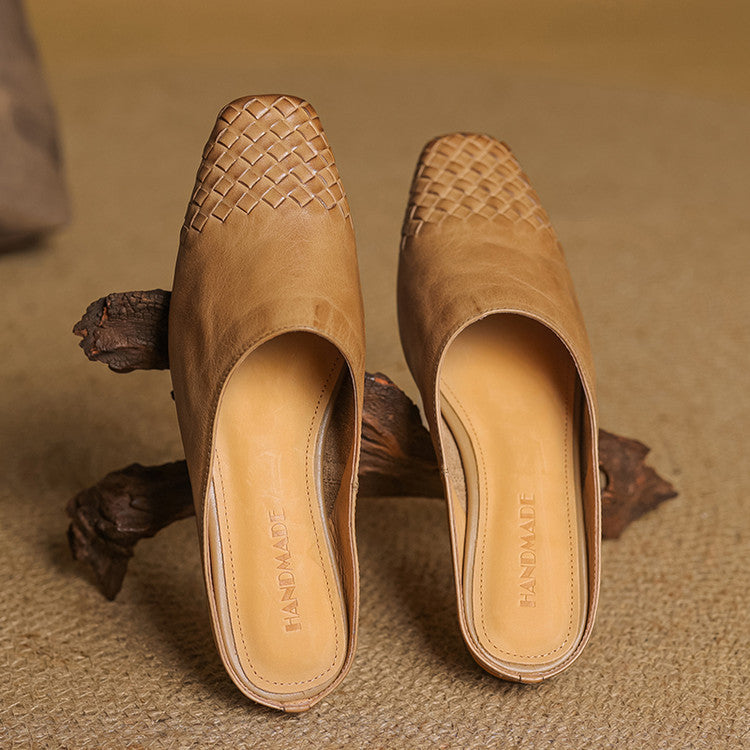 Black leather mules featuring a cushioned insole and woven finish, designed with a square-toe heel for stylish comfort. 4