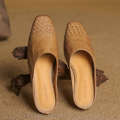 Black leather mules featuring a cushioned insole and woven finish, designed with a square-toe heel for stylish comfort. 4