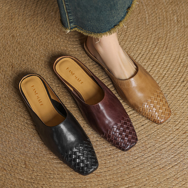 Black leather mules featuring a cushioned insole and woven finish, designed with a square-toe heel for stylish comfort. 6