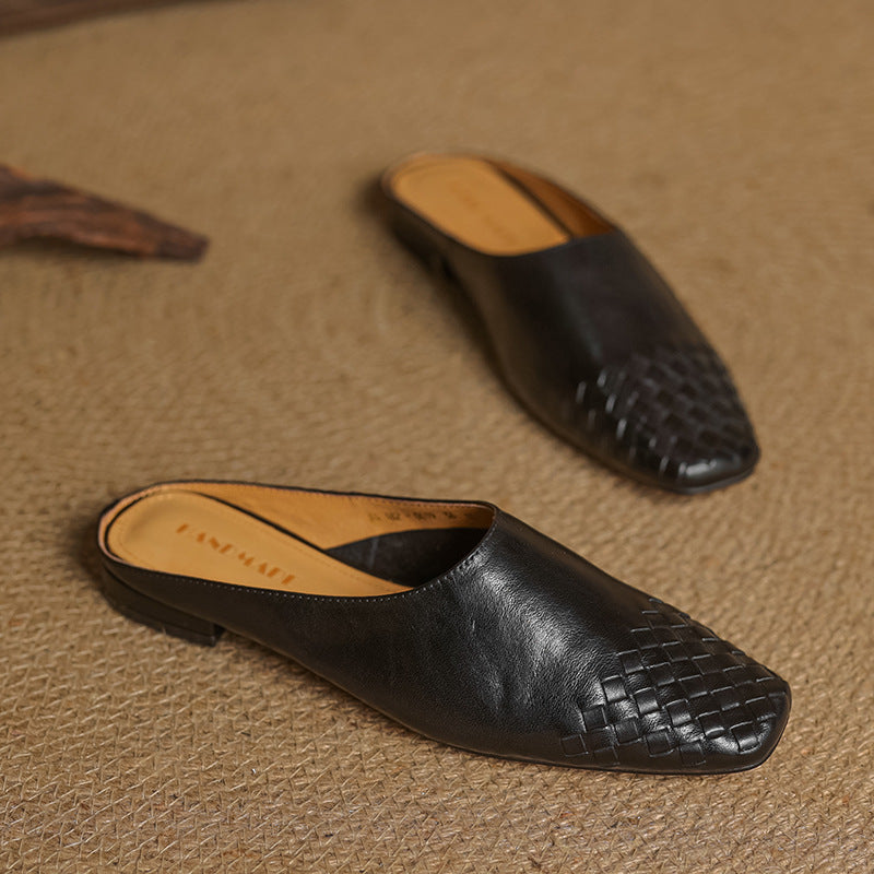 Black leather mules featuring a cushioned insole and woven finish, designed with a square-toe heel for stylish comfort. 9