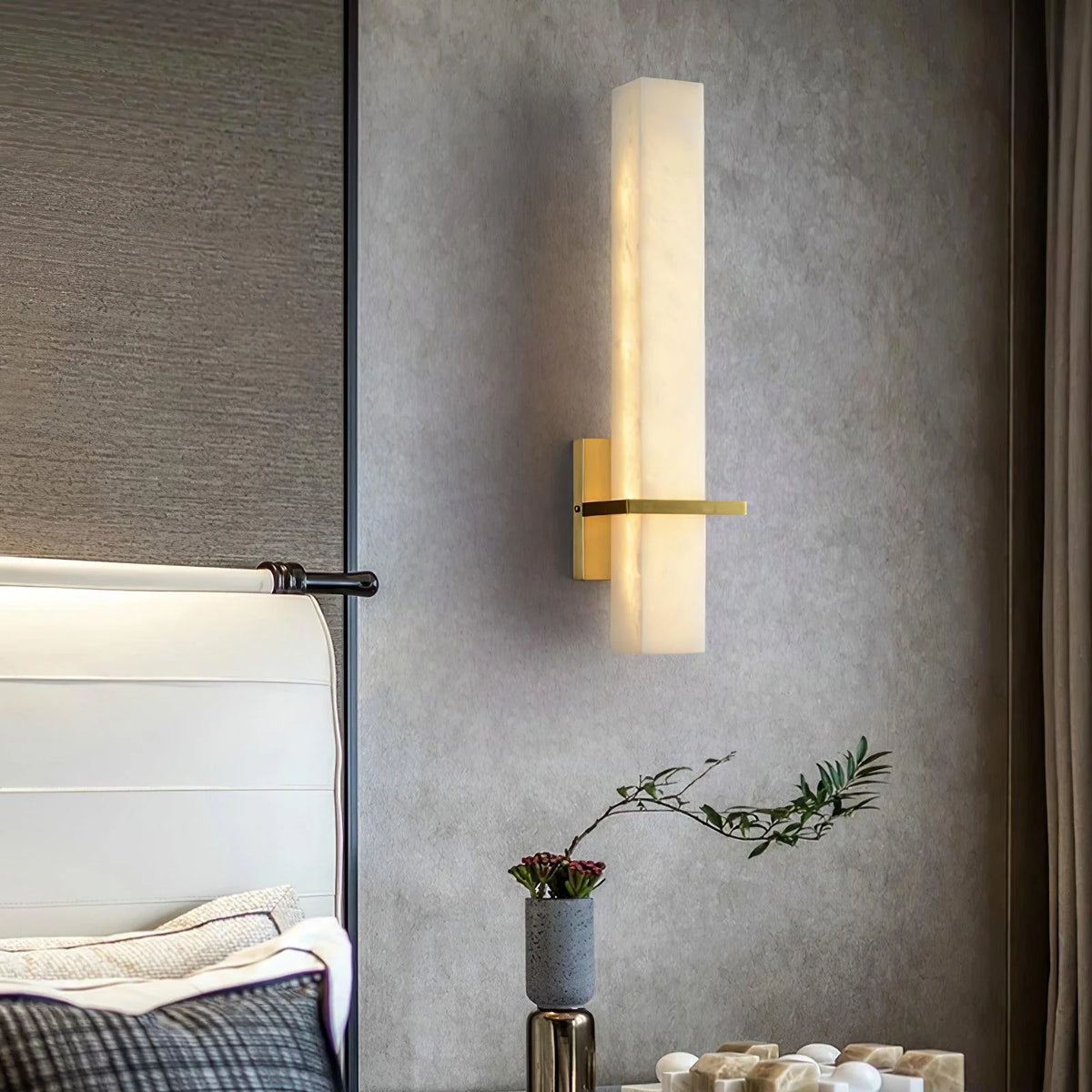Modern linear wall light featuring an elegant alabaster diffuser, available in dimmable brass or nickel finish, designed to enhance ambient lighting in contemporary interiors. 2
