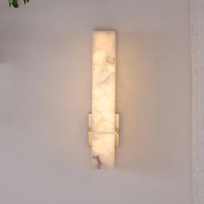 Modern linear wall light featuring an elegant alabaster diffuser, available in dimmable brass or nickel finish, designed to enhance ambient lighting in contemporary interiors. 4