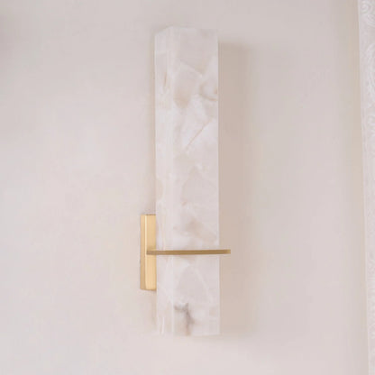 Modern linear wall light featuring an elegant alabaster diffuser, available in dimmable brass or nickel finish, designed to enhance ambient lighting in contemporary interiors. 6