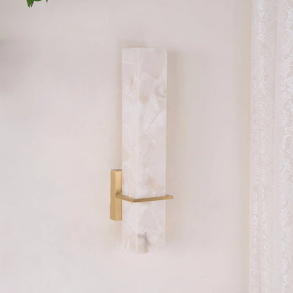 Modern linear wall light featuring an elegant alabaster diffuser, available in dimmable brass or nickel finish, designed to enhance ambient lighting in contemporary interiors. 7