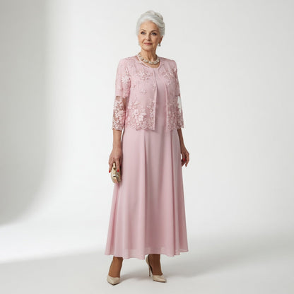 Long formal dress featuring intricate floral appliqués and embellished sleeves, designed for elegance at weddings and special occasions, with a flattering flared silhouette. 0