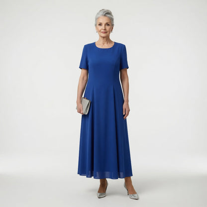 Long formal dress featuring intricate floral appliqués and embellished sleeves, designed for elegance at weddings and special occasions, with a flattering flared silhouette. 4