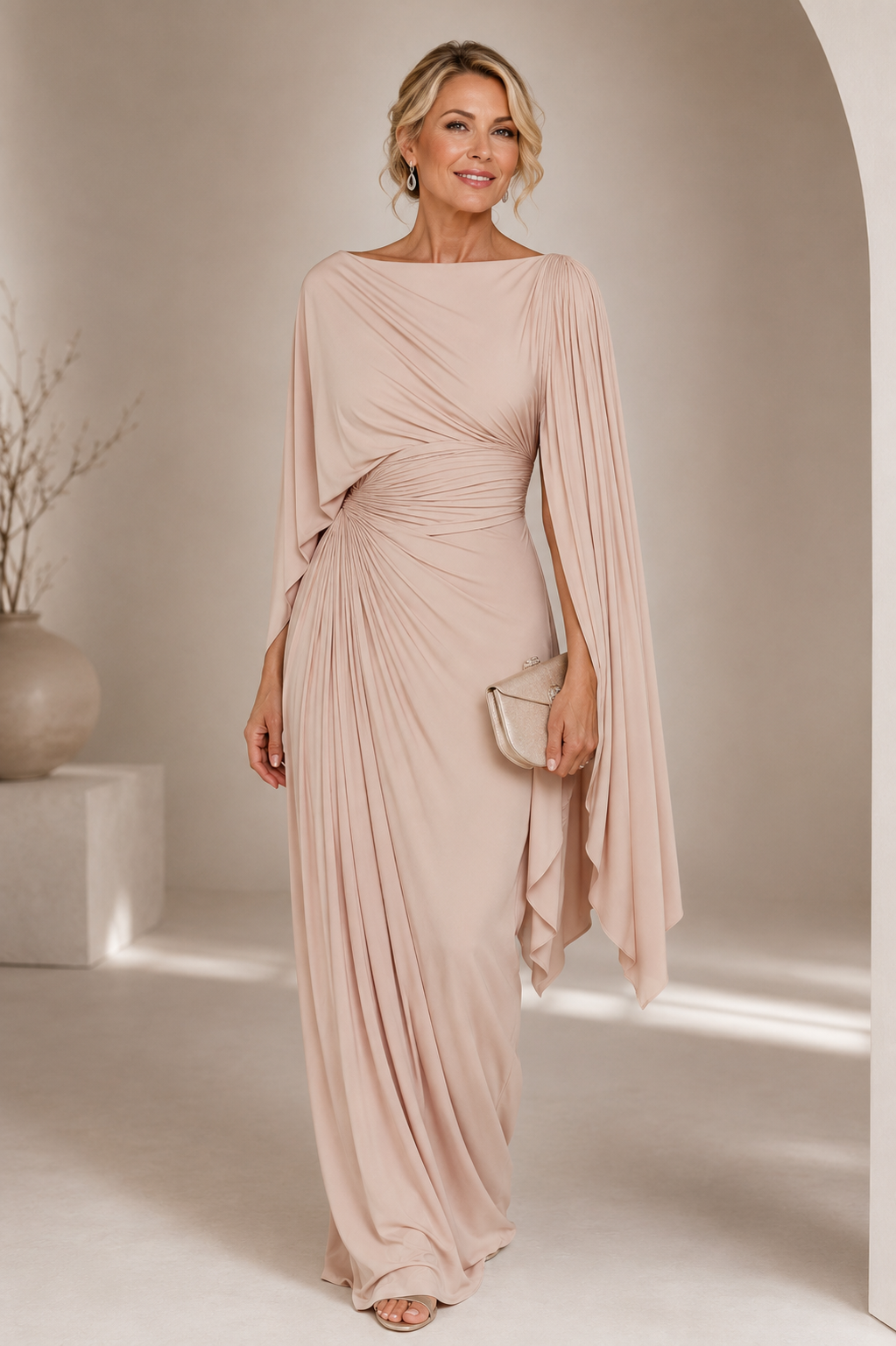 Elegant maxi dress featuring flowing cape sleeves and a ruched waist, perfect for formal occasions. 0