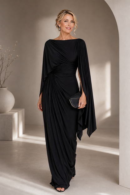 Elegant maxi dress featuring flowing cape sleeves and a ruched waist, perfect for formal occasions. 1