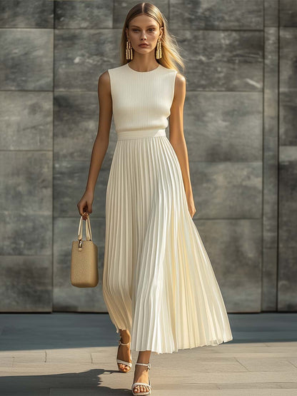 Elegant maxi dress featuring a pleated knit chiffon fabric and a stylish round neck design, perfect for formal occasions and summer events. 1