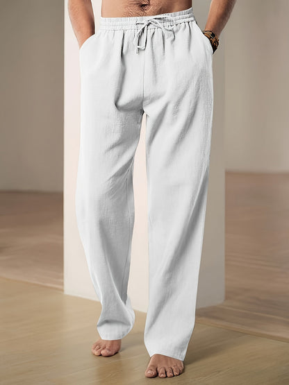 Men's linen pants featuring an elastic waist and loose fit, designed for breathability and all-day comfort, perfect for casual wear. 0