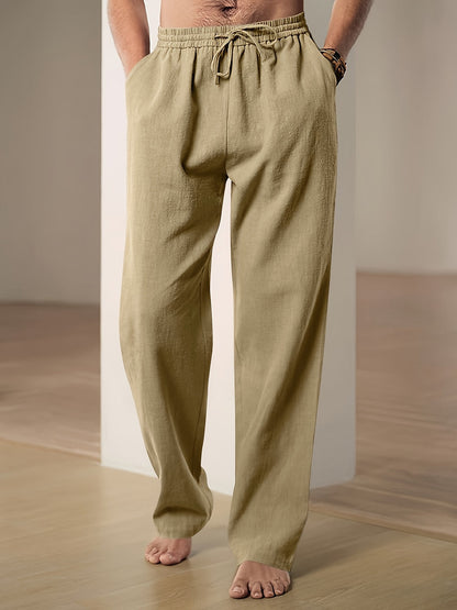 Men's linen pants featuring an elastic waist and loose fit, designed for breathability and all-day comfort, perfect for casual wear. 4