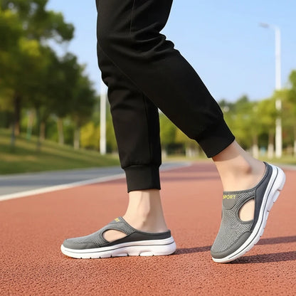 Men's orthopedic slip-on slippers featuring a breathable mesh upper, designed for wide fit comfort, perfect for both indoor and outdoor wear. 4