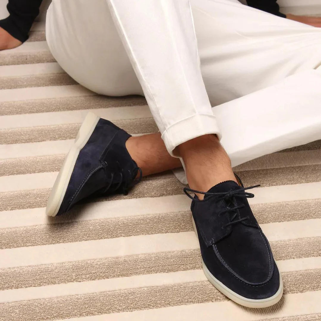 Men's sneakers featuring a cushioned rubber sole and soft suede upper, designed for comfort and style in casual lace-up design. 0