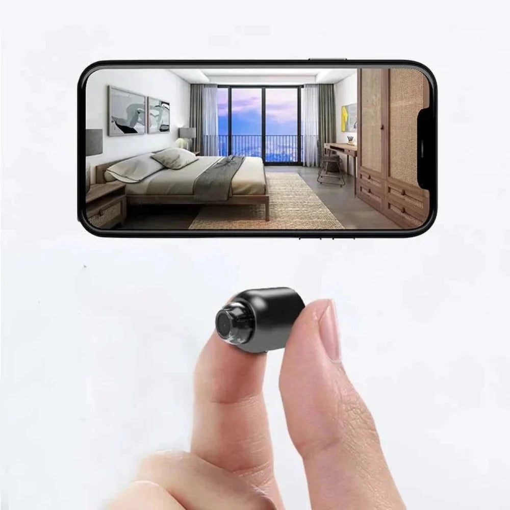 Mini WiFi security camera featuring 1080P HD video quality, night vision capability, and motion detection alerts, designed for compact home security monitoring. 0