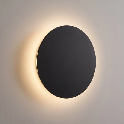 Minimalist LED wall light in black and white, featuring touch dimming and a wireless USB rechargeable design, perfect for modern home decor. 1