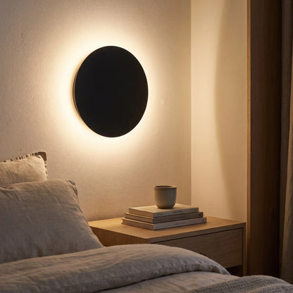 Minimalist LED wall light in black and white, featuring touch dimming and a wireless USB rechargeable design, perfect for modern home decor. 2