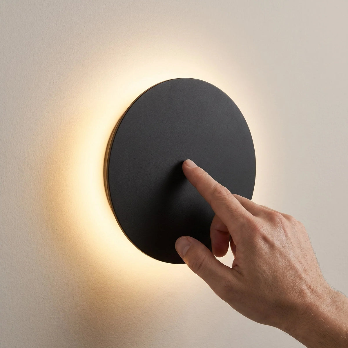 Minimalist LED wall light in black and white, featuring touch dimming and a wireless USB rechargeable design, perfect for modern home decor. 4