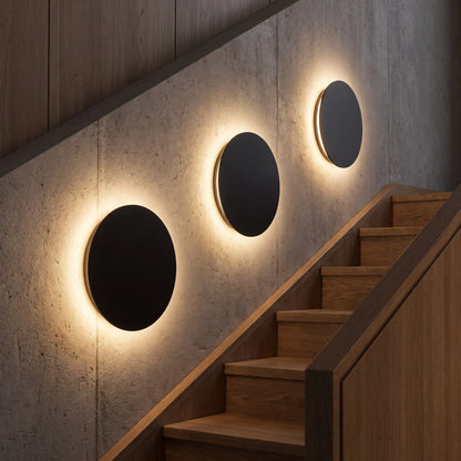 Minimalist LED wall light in black and white, featuring touch dimming and a wireless USB rechargeable design, perfect for modern home decor. 6