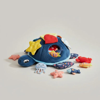 Montessori Sensory Sea Turtle Toy featuring removable soft sea creatures, designed for tactile play and early learning development in children. 0