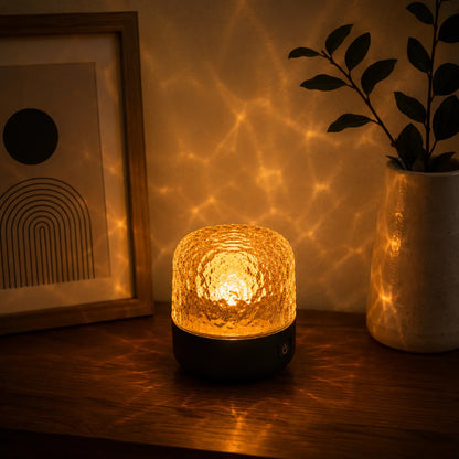 Mood lamp featuring a crystal glass design, equipped with a Bluetooth speaker and adjustable light settings for a customizable ambiance. 3