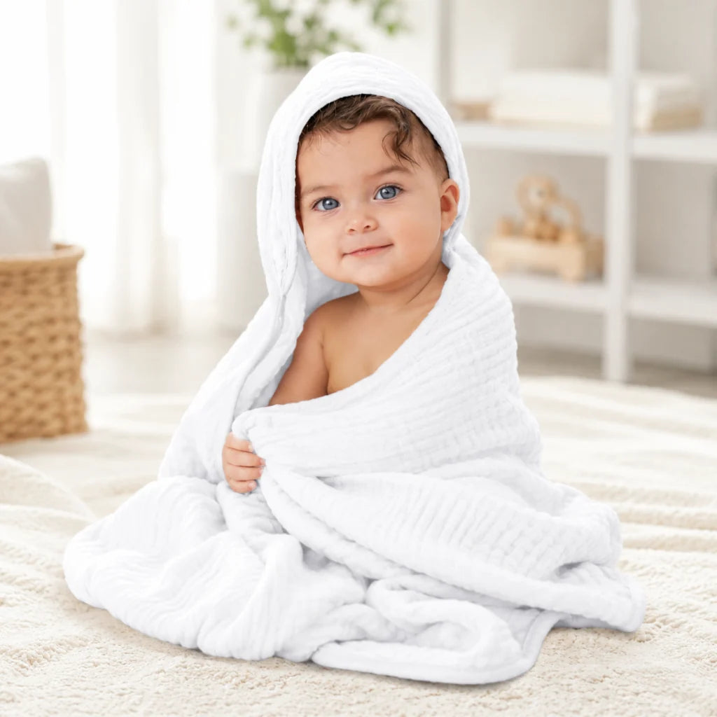 Muslin baby hooded towel set in Pacific blue fern design, made from soft absorbent cotton, perfect for newborns and toddlers, lightweight and cozy 0