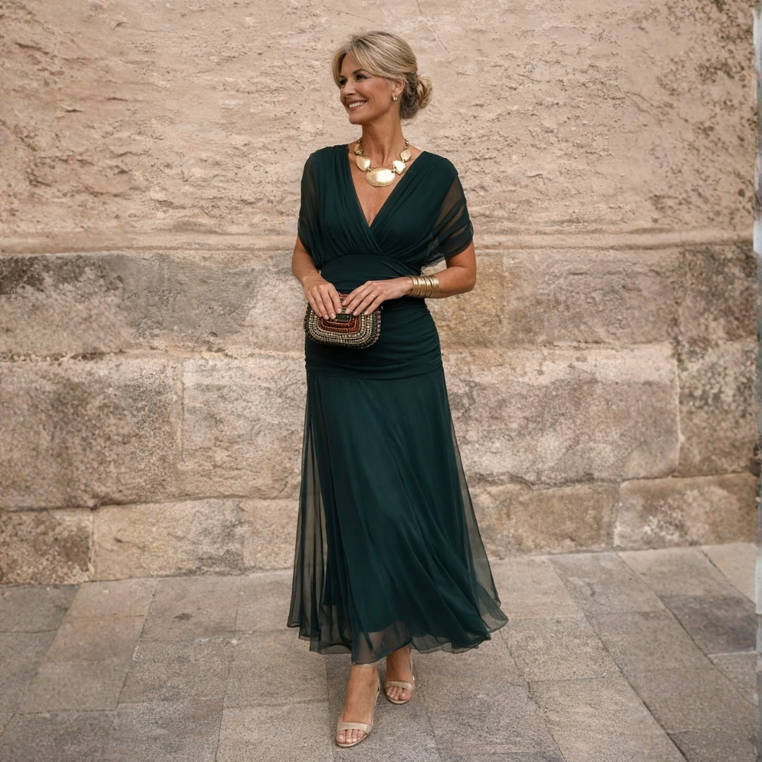 Elegant off-shoulder maxi dress in draped chiffon featuring a flattering mermaid silhouette, perfect for formal occasions, designed for women. 0