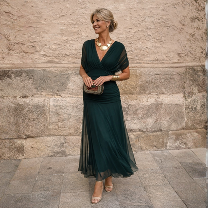 Elegant off-shoulder maxi dress in draped chiffon featuring a flattering mermaid silhouette, perfect for formal occasions, designed for women. 0