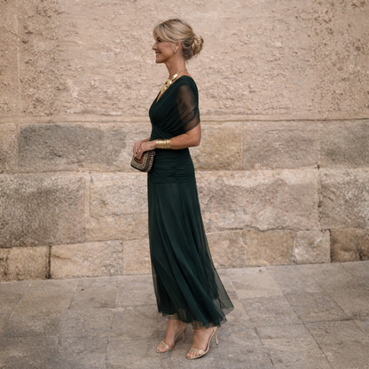 Elegant off-shoulder maxi dress in draped chiffon featuring a flattering mermaid silhouette, perfect for formal occasions, designed for women. 1