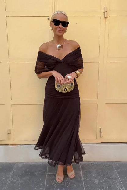 Elegant off-shoulder maxi dress in draped chiffon featuring a flattering mermaid silhouette, perfect for formal occasions, designed for women. 4