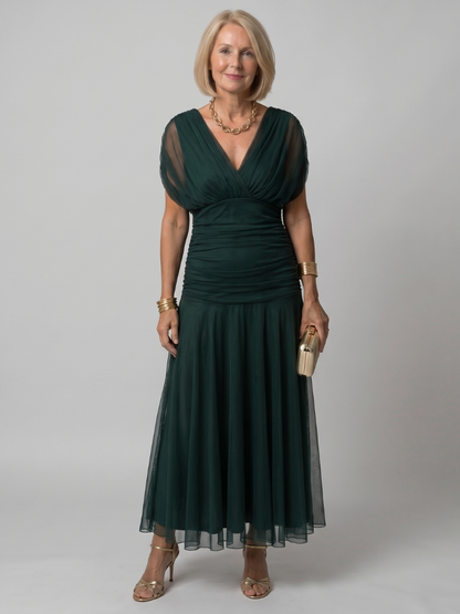 Off shoulder midi dress with draped neckline, perfect lightweight summer attire for wedding guests and cocktail events. 11