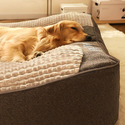 Orthopedic dog bed featuring a raised pillow and soft velor cover, designed for joint support and comfort for pets. 3