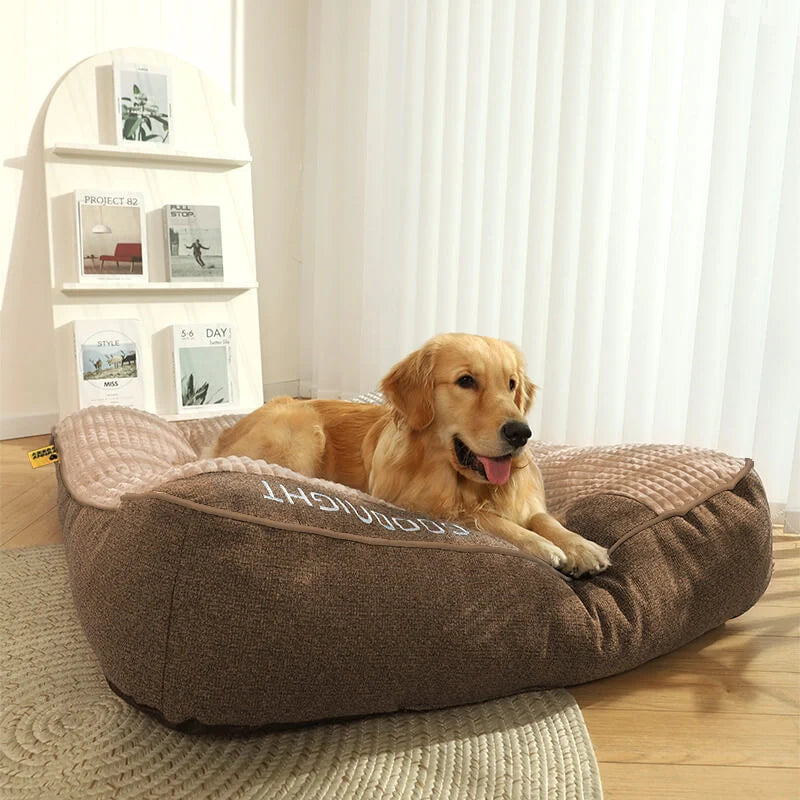 Orthopedic dog bed featuring a raised pillow and soft velor cover, designed for joint support and comfort for pets. 5