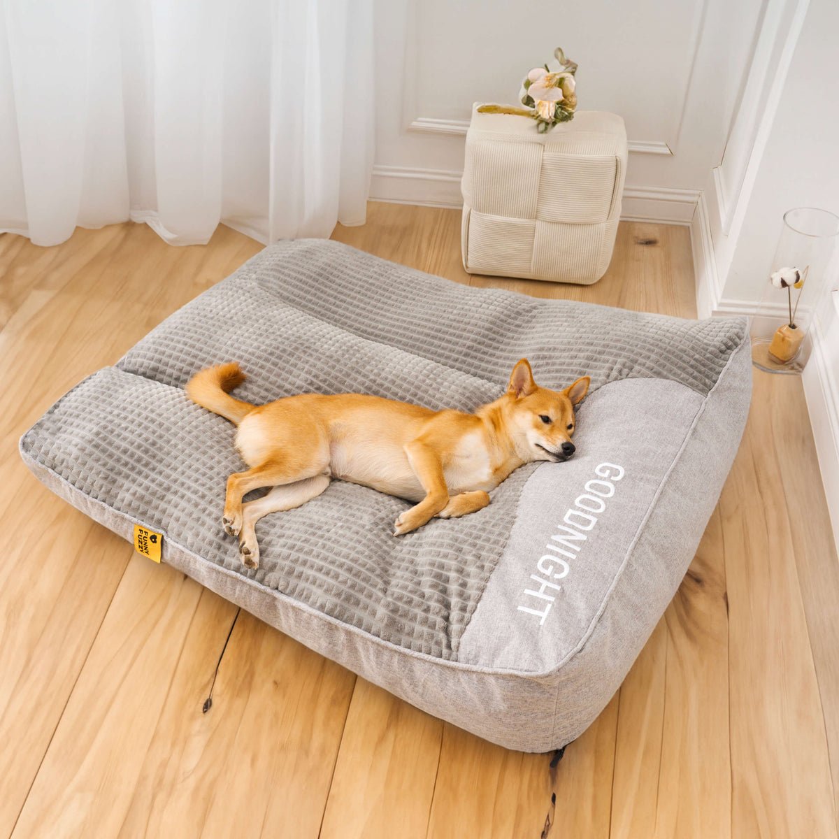 Orthopedic dog bed featuring a raised pillow and soft velor cover, designed for joint support and comfort for pets. 6
