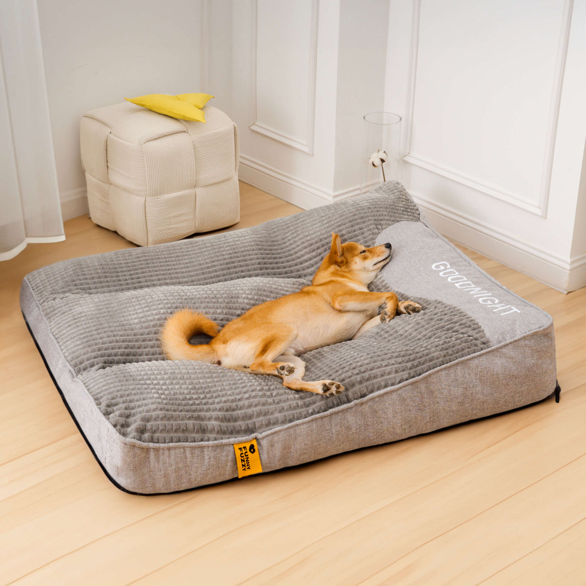 Orthopedic dog bed featuring a raised pillow and soft velor cover, designed for joint support and comfort for pets. 7