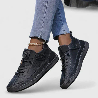 Orthopedic sneakers designed for comfort and support, featuring arch support and a shock-absorbing EVA sole for enhanced cushioning and stability. 0