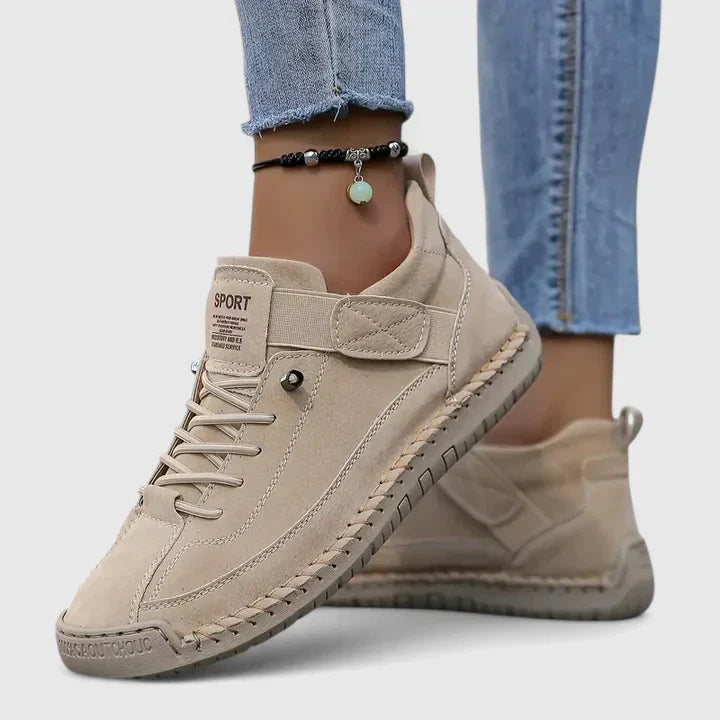 Orthopedic sneakers designed for comfort and support, featuring arch support and a shock-absorbing EVA sole for enhanced cushioning and stability. 1