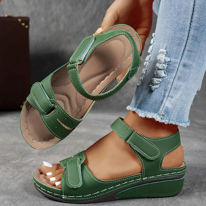 Orthopedic wedge sandals for women featuring cushioned support, adjustable fit, and a lightweight breathable design for all-day comfort. 0