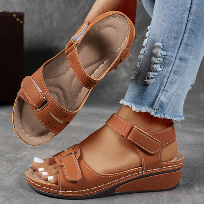 Orthopedic wedge sandals for women featuring cushioned support, adjustable fit, and a lightweight breathable design for all-day comfort. 9