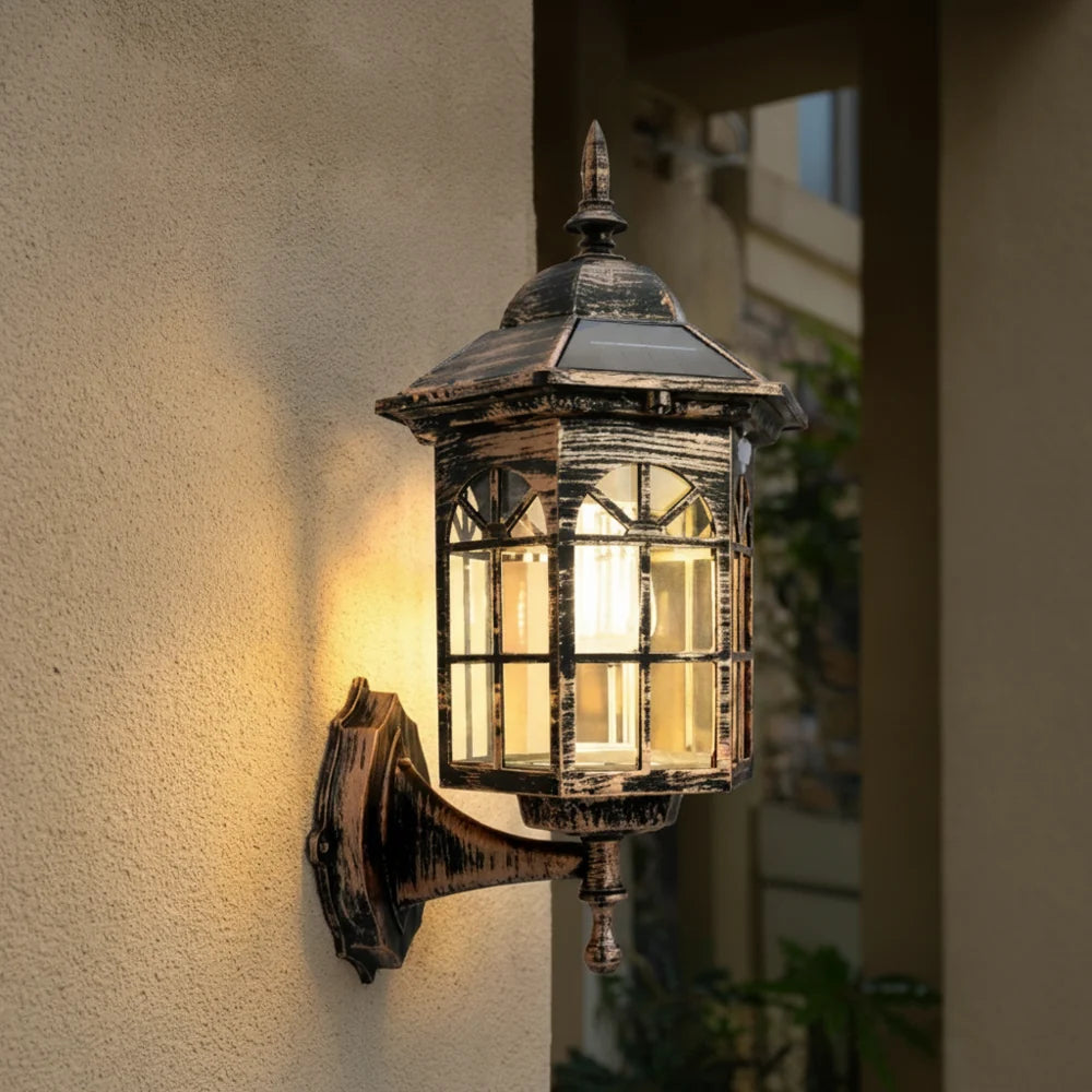 Outdoor solar wall light featuring a vintage design, equipped with a motion sensor for enhanced security, weatherproof construction ideal for outdoor use. 1
