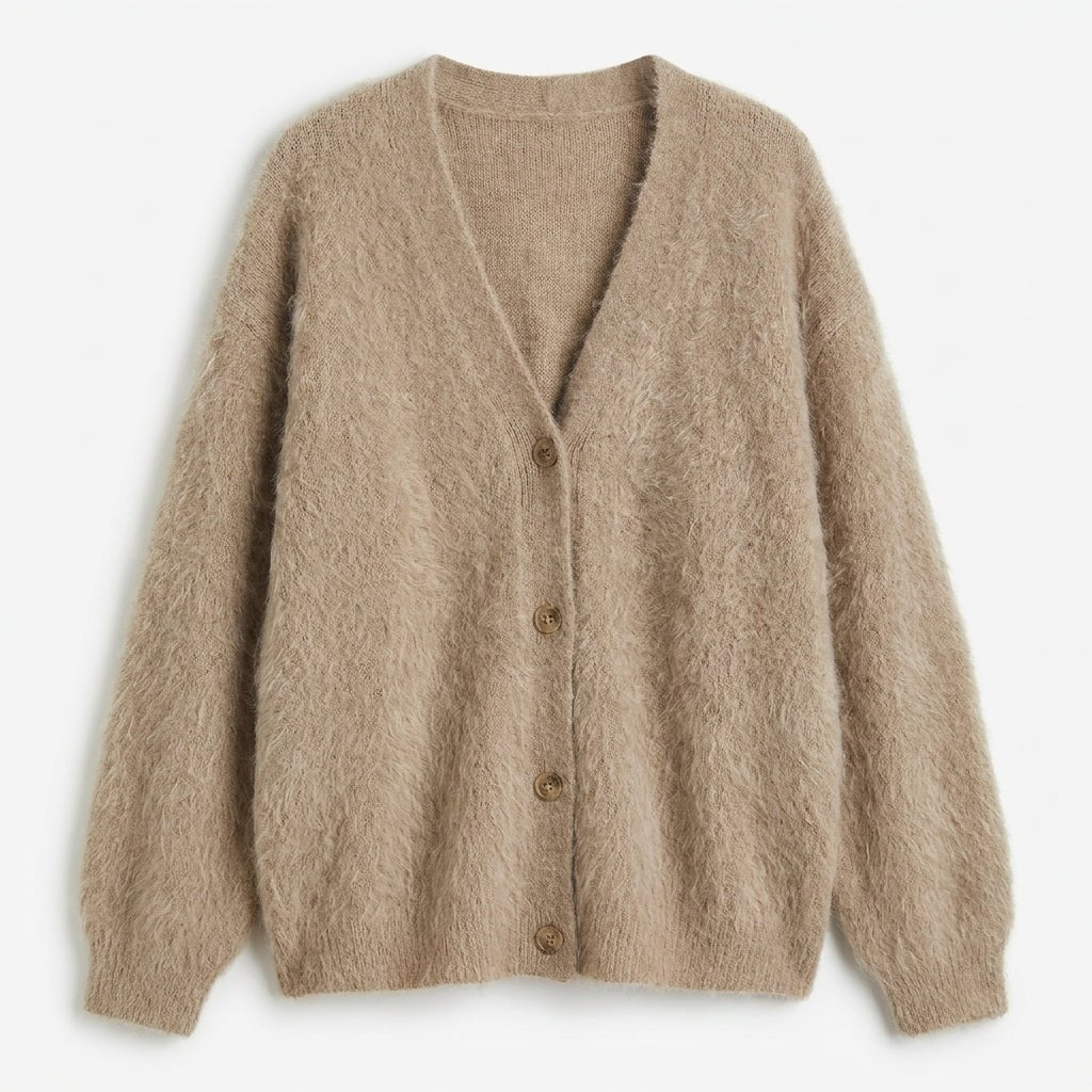Oversized women's cardigan featuring a deep V-neck and relaxed fit, made from soft knit fabric, perfect for layering. 1