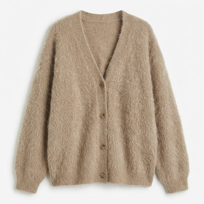 Oversized women's cardigan featuring a deep V-neck and relaxed fit, made from soft knit fabric, perfect for layering. 1