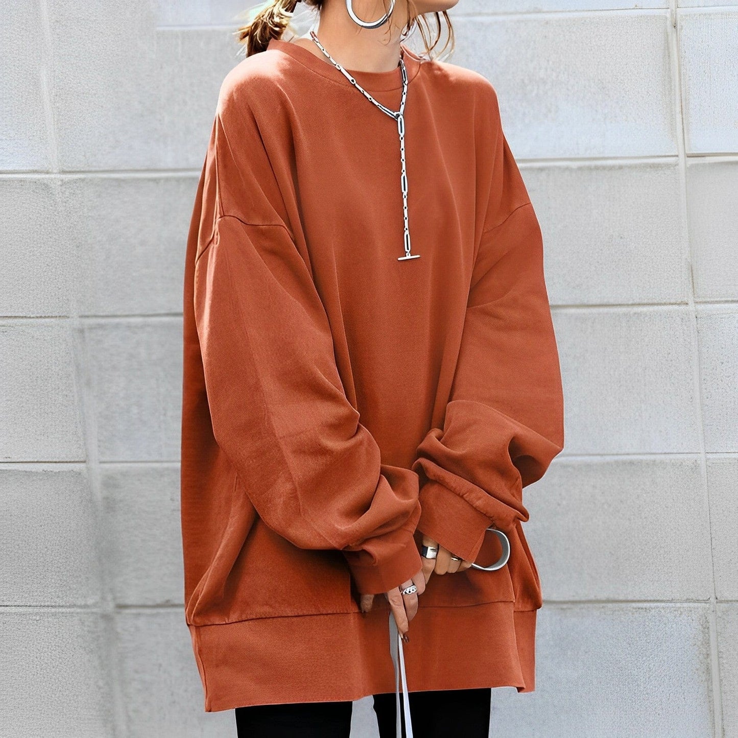Oversized women's sweatshirt featuring a soft cotton-polyester blend, designed with a minimalist casual aesthetic and relaxed fit for ultimate comfort. 4