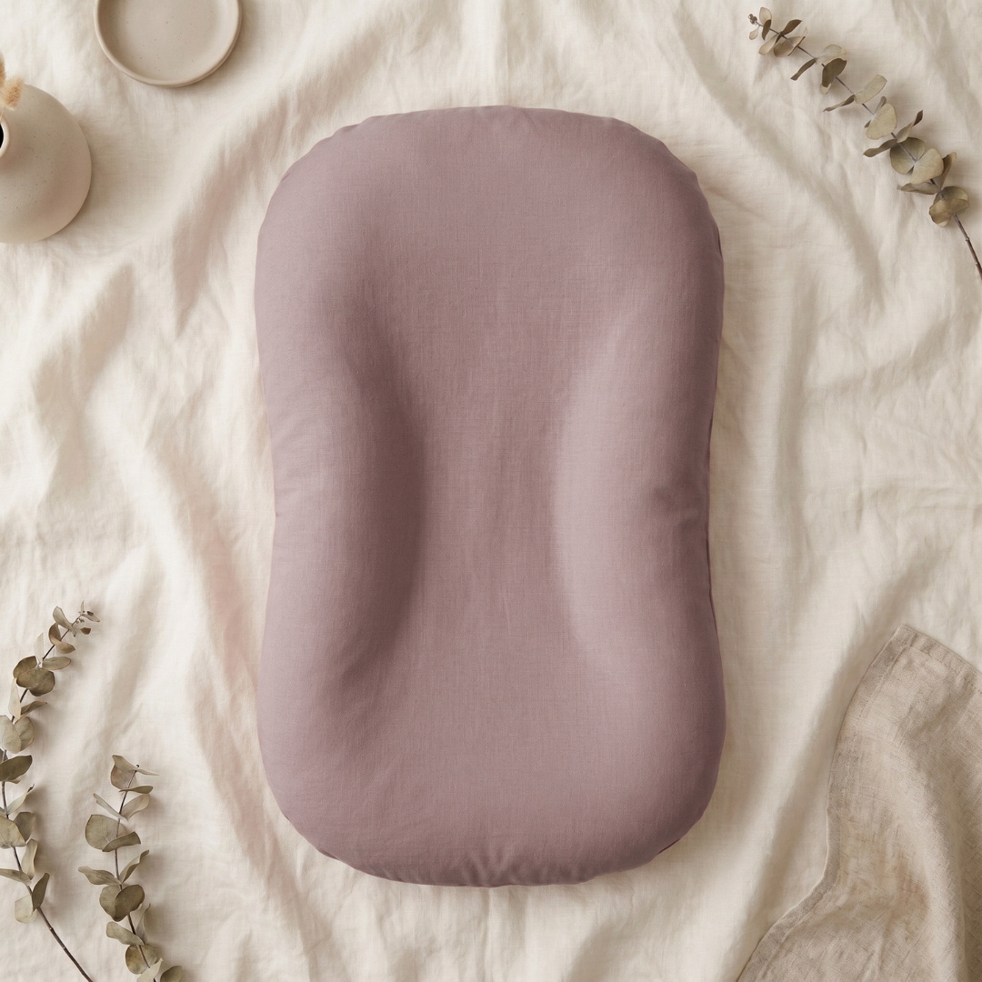 Pastel Baby Lounger Nest featuring breathable materials and raised edges for enhanced comfort and safety. 5