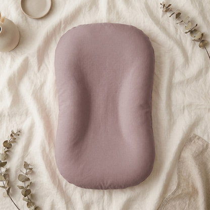 Pastel Baby Lounger Nest featuring breathable materials and raised edges for enhanced comfort and safety. 5