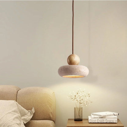 Pendant light featuring a warm LED glow, designed with a modern wood and concrete finish, perfect for compact kitchen and dining spaces. 1