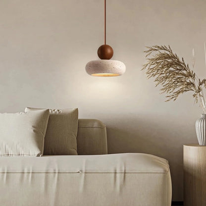 Pendant light featuring a warm LED glow, designed with a modern wood and concrete finish, perfect for compact kitchen and dining spaces. 3