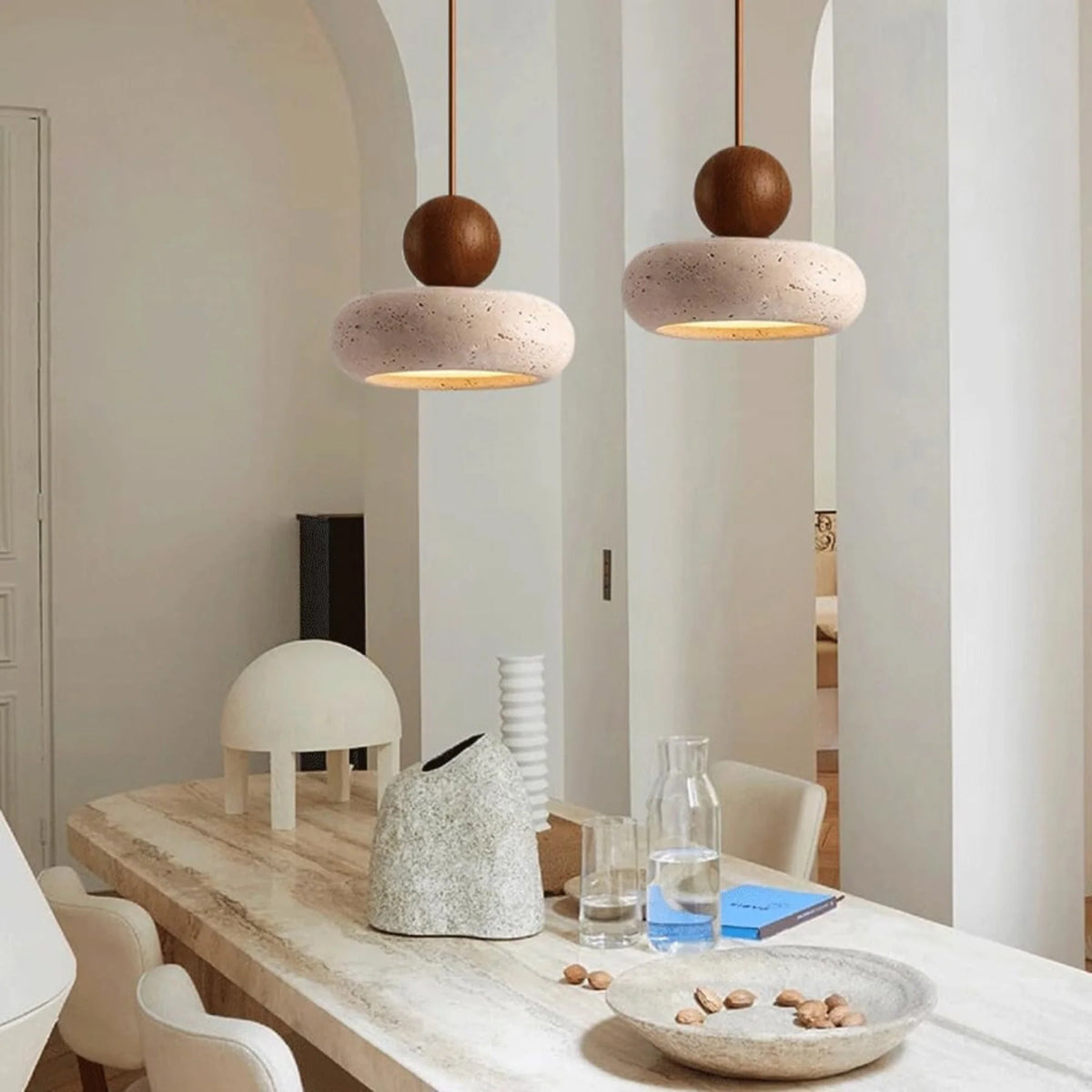 Pendant light featuring a warm LED glow, designed with a modern wood and concrete finish, perfect for compact kitchen and dining spaces. 4
